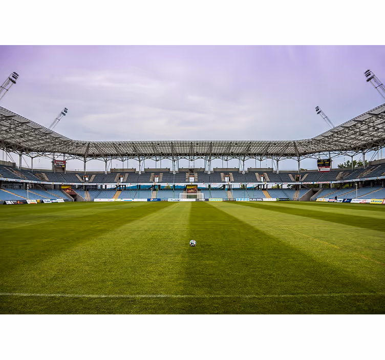 Tapisserie villes et pays scène de terrain de foot - TenStickers