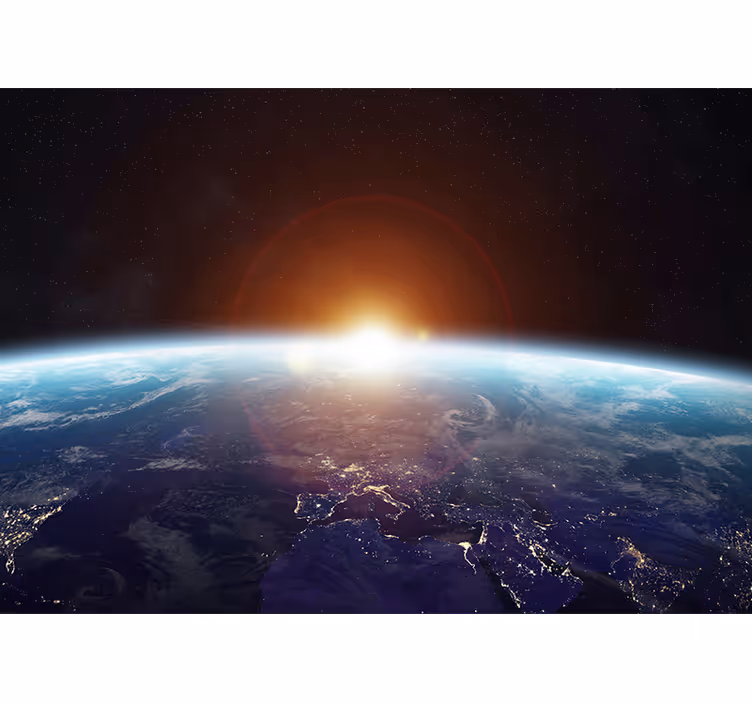 Tapisserie espace vue du lever de soleil sur terre - TenStickers