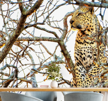 Tapisserie autres animaux léopard parmi les branches - TenStickers