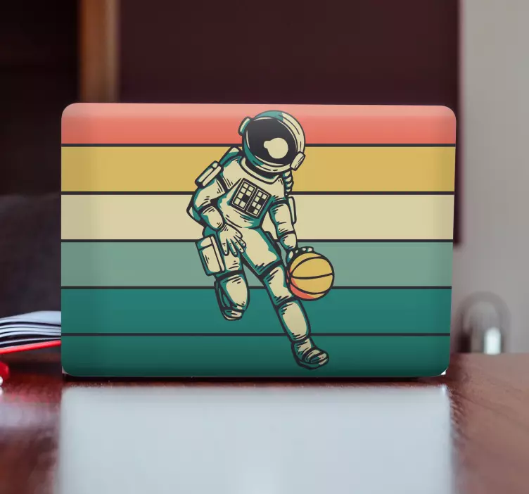 Sticker pour ordinateur astronaute jouant au ballon - TenStickers