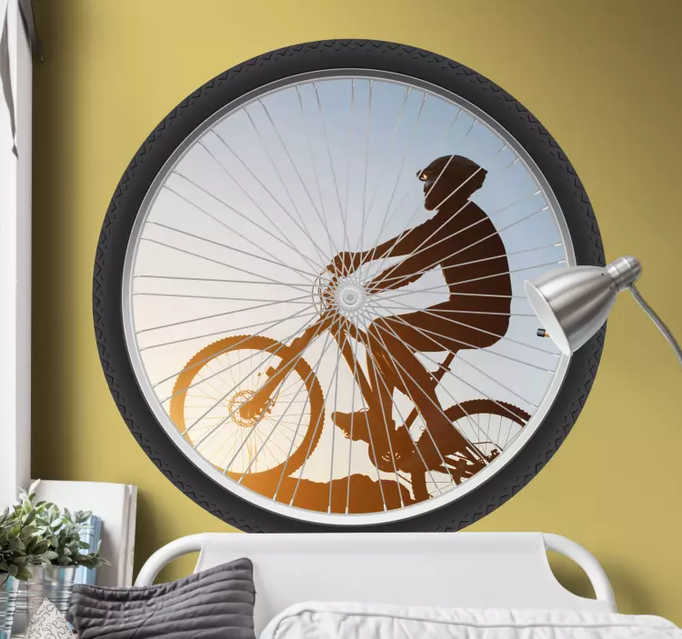 Sticker cycliste roue de silhouette de motard - TenStickers