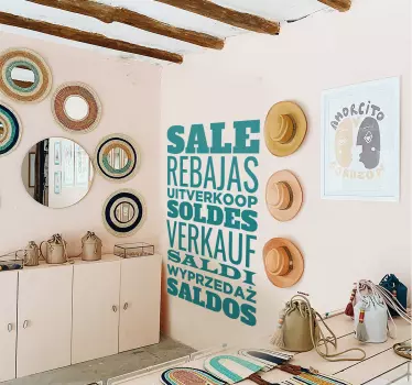 Sticker vitrine soldes plusieurs langues - TenStickers