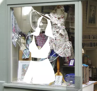 Sticker vitrine silhouette de femme élégante - TenStickers