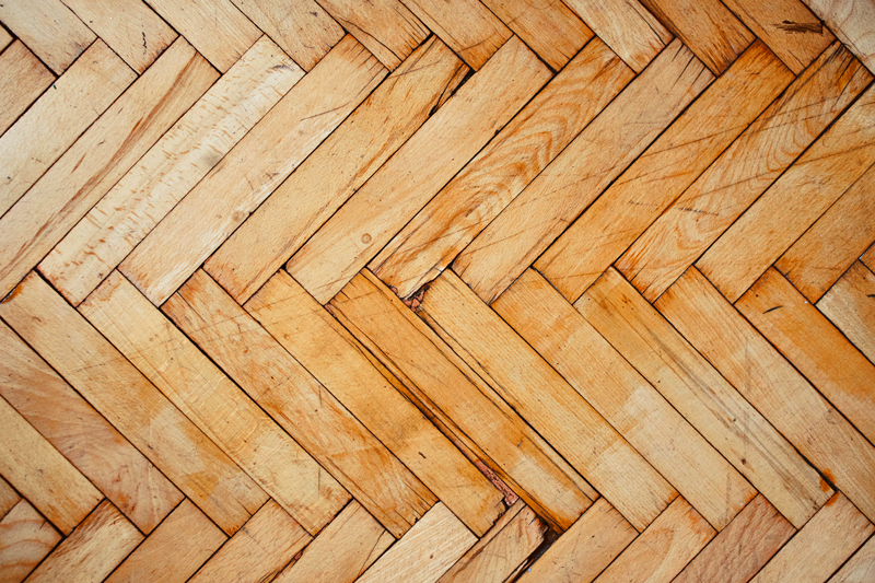 Tapis vinyle imitation parquet motif à chevrons - TenStickers